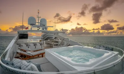 Zoom Zoom Zoom: Top deck jacuzzi, sunloungers and bar at sunset over the sea