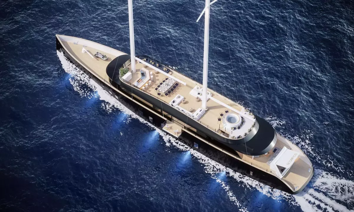 Scorpios: Two masted yacht under way seen from above, with deck lounges, dining table and blue underwater lights