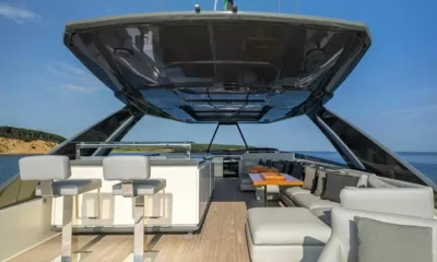 Date Night: Flybridge under a hardtop with bar stools, wet bar and lounge seating