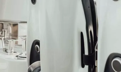 Bluegame74: Close view of white underwater scooters stored beside chrome deck fittings