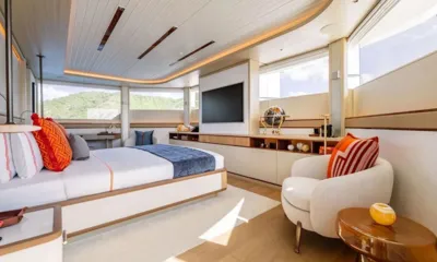 Ad Astra: Spacious cabin with double bed, armchair, television and panoramic windows
