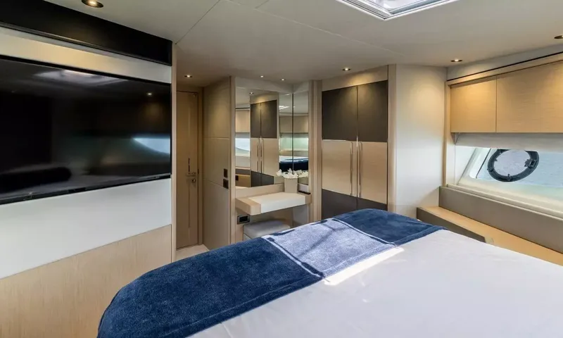 Ascend: Cabin with bed, wall television, vanity desk and wardrobe