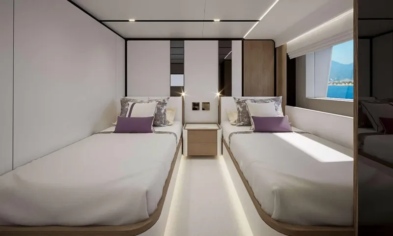 Yoto: Twin cabin with two single beds, purple cushions and a window