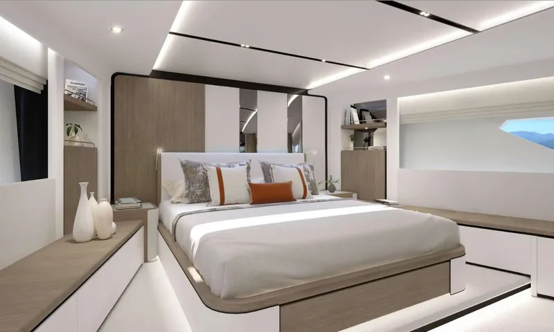 Yoto: Double cabin with orange accent pillows, side benches and small hull window