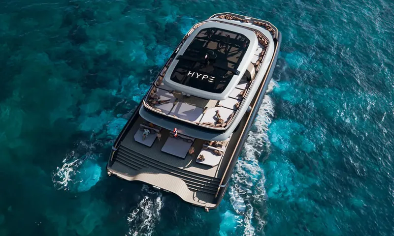HYP3: Overhead view of catamaran under way showing upper deck lounges, aft sunbeds and stepped stern