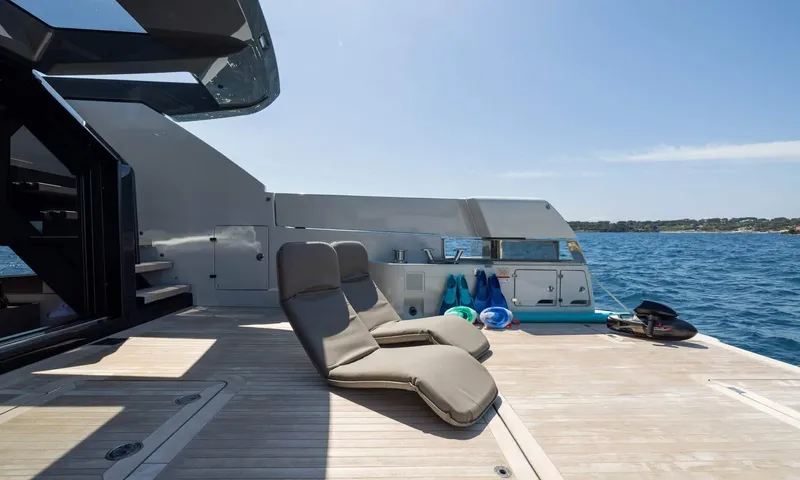 Jamon: Aft deck with two loungers, fins, masks and an underwater scooter