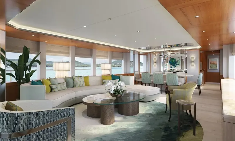Lumière: Bright saloon with curved sofa, round glass table and dining chairs near wide windows
