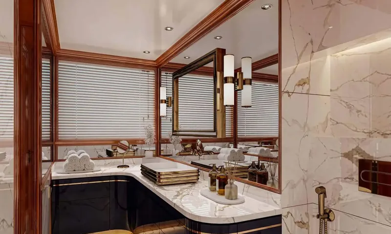 Isabell Princess of the Sea: Rendering of a marble bathroom with curved vanity, mirror, wall lights and rolled towels
