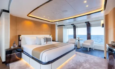 Orion: Large cabin with double bed, lit ceiling and seating area by sea view windows