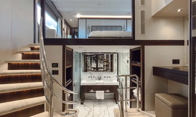 Nigora: Split level cabin with bed above, staircase and ensuite basin below